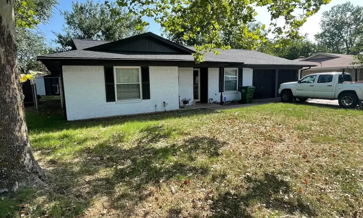 Professional roofing crew working on a residential roof in Haiku-Pauwela